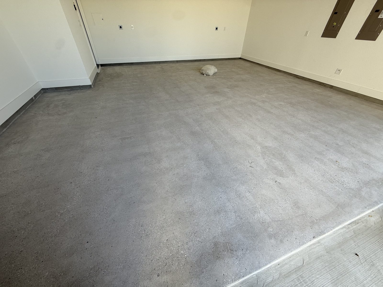 Full garage slab diamond ground and vacuumed for coating prep