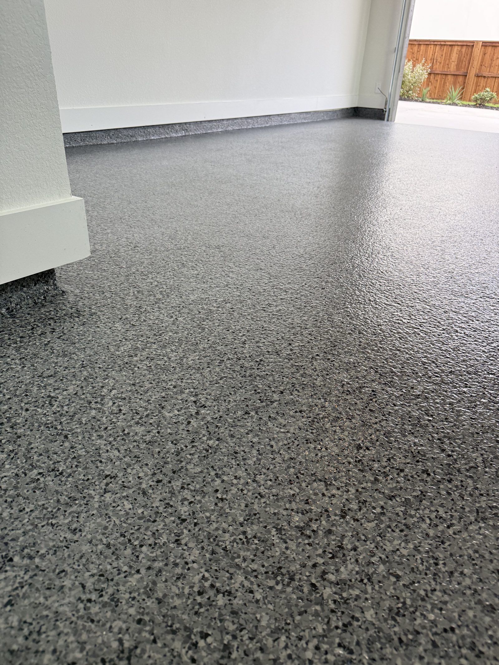 Flake floor with fresh cove base, recent build